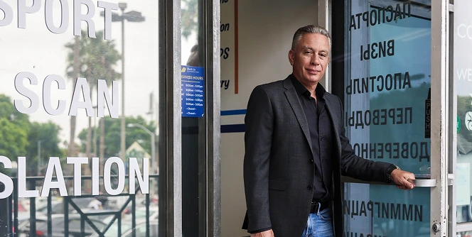 Vadim Pechersky at the door of the Rush In Documentation Center office