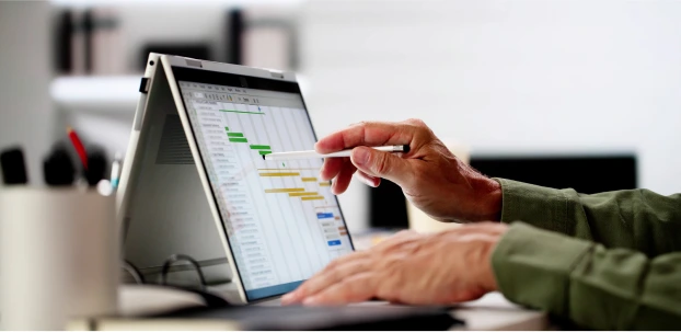 Booking a notary appointment on a laptop calendar