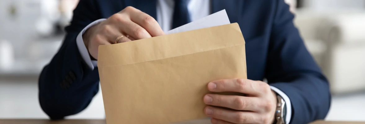 Specialist reviewing documents before submission