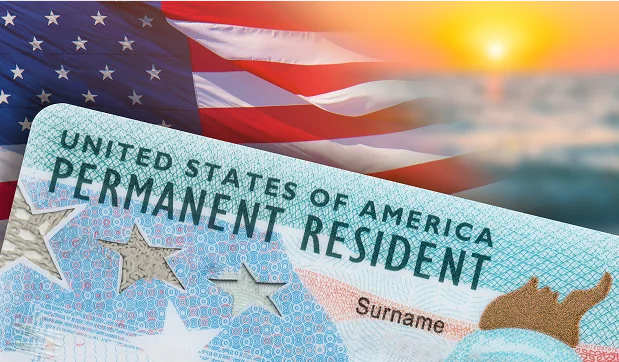 United States permanent resident card against the Stars and Stripes