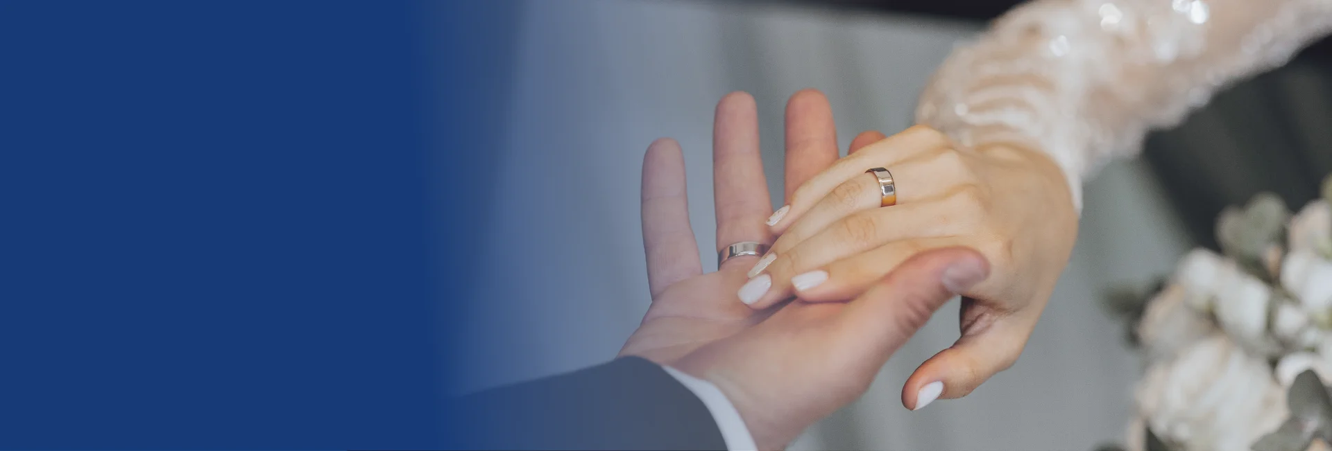 Newlyweds' hands with wedding rings