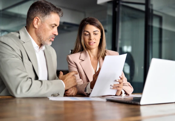 Rush In Documentation Center visa specialists with a client